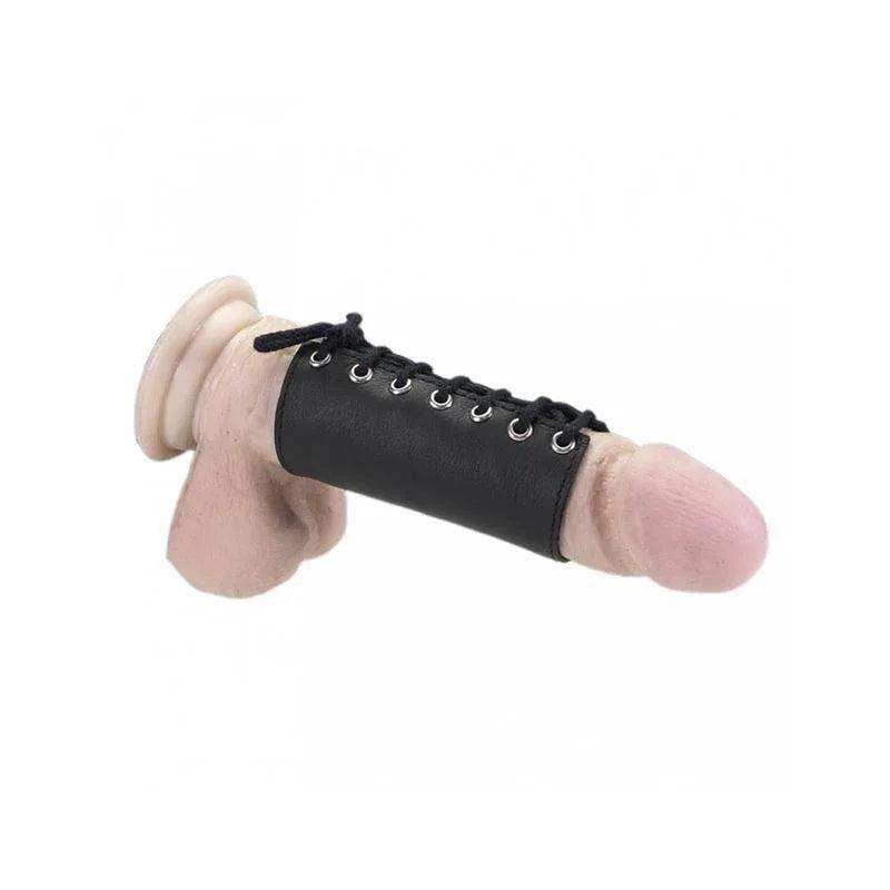 Leather Cock Rings: flesh-toned penis-shaped accessory with a black lace-up leather sleeve and metal eyelets