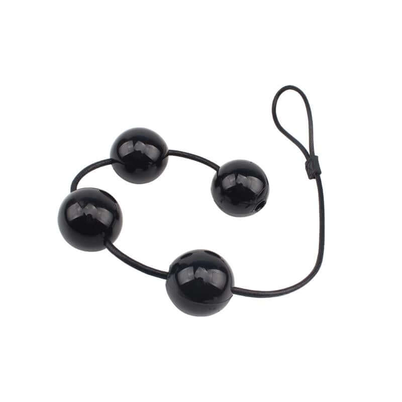 Anal Balls featuring four glossy black rounded beads connected by a flexible cord with a looped handle