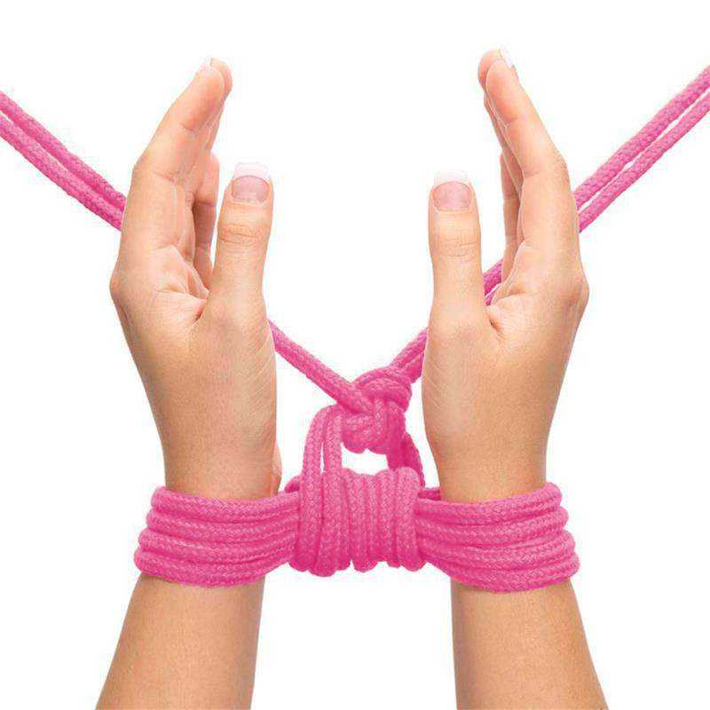 assorted bondage gear including restraints cuffs and blindfolds
