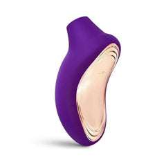 Clitoris Suckers purple silicone clitoral stimulator with a smooth, contoured body and pale rose-gold inner surface