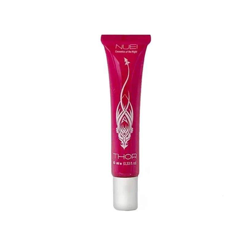 Displays featuring a magenta THOR squeeze tube with an ornate white emblem and a white screw cap