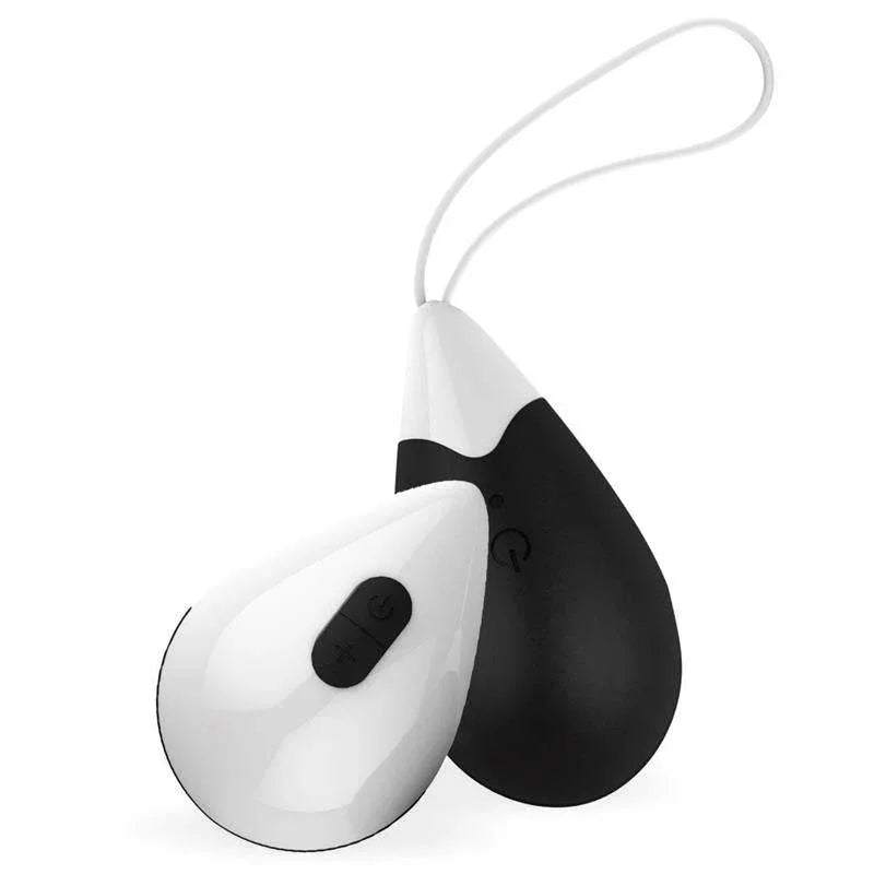 DROPS wearable device with a smooth white and black teardrop-shaped body, control buttons and a loop cord