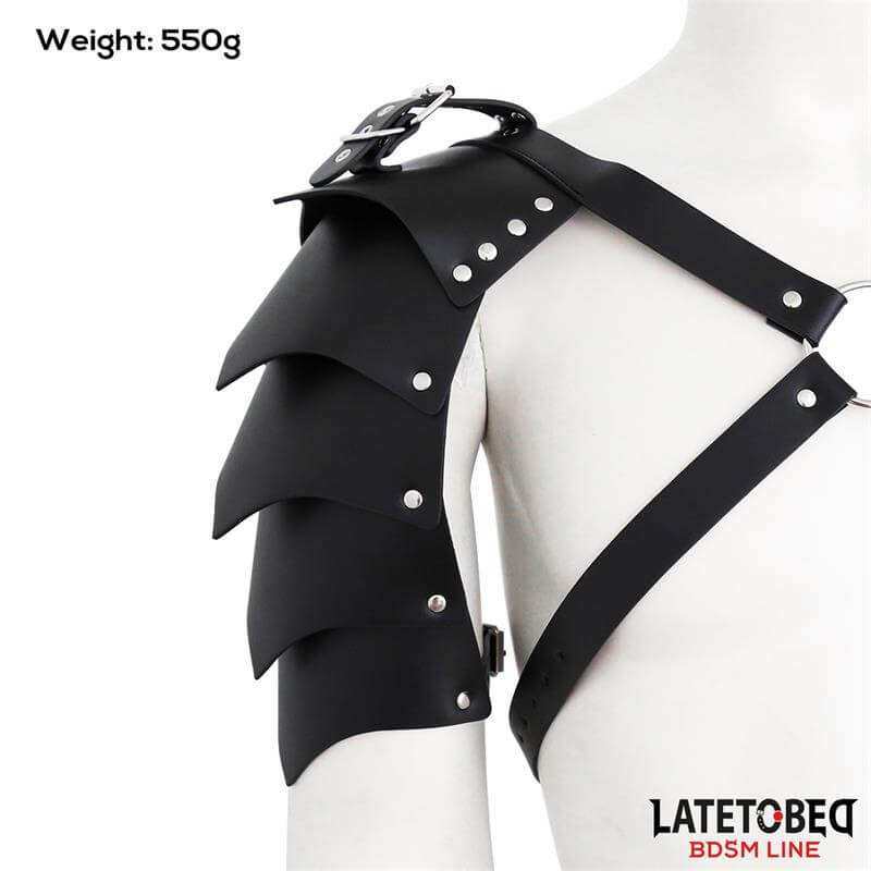 Fetish/Bondage black leather shoulder harness with layered pointed panels, silver rivets, and adjustable buckle straps