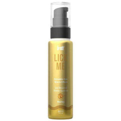 Warming Lubricants gold honey kissable gel in a clear-capped bottle with black pump and warm effect label