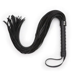 Svart flogger i läder med handledsrem från kollektionen piskor paddlar och floggers för intensiv BDSM-njutning