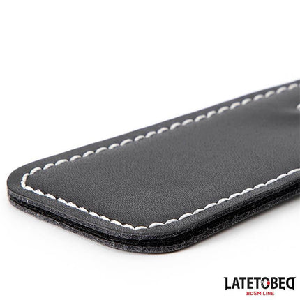 2-in-1 Paddle with feather