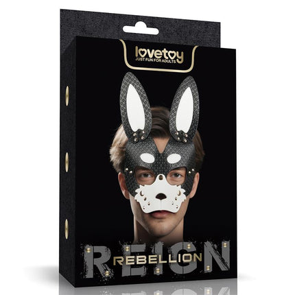Rebellion Reign Rebel Bunny Mask in black and white PU with tall ears, removable muzzle, adjustable straps, and metal rivets