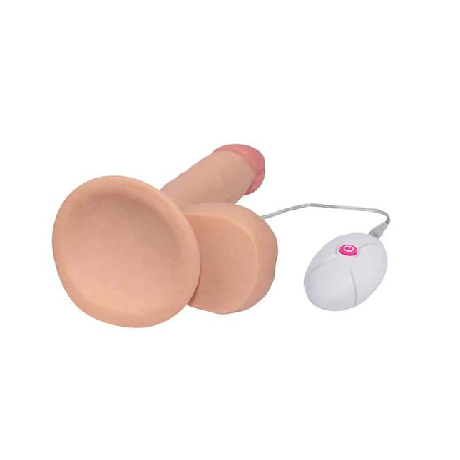 Ultra Soft Dude 7.5-inch flesh-tone dildo with vibration, suction base, and realistic texture
