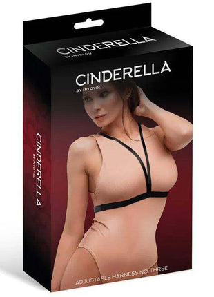 Adjustable Harness No. Three shown on a black product box, featuring a model wearing a minimalist black strap harness