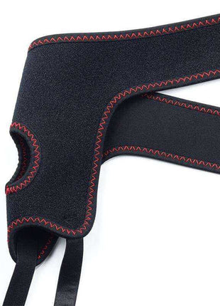 Adjustable Strapon with Dildo 7.5 harness made of black fabric with red zigzag stitching and an open ring