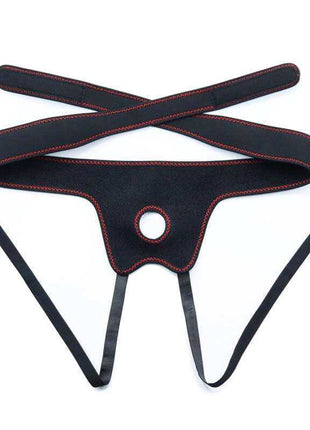 Adjustable Strapon with Dildo 7.5 harness in black fabric with red stitching, adjustable straps and circular opening