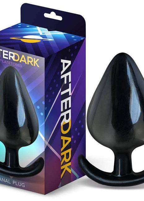 Alphona L Butt Plug in glossy black silicone with a smooth tapered body and wide flared base beside its After Dark box