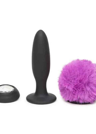 Purple anal plug with vibration and double base for safe, comfortable, and customizable pleasure