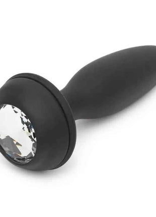 Purple anal plug with vibration and double base for safe, comfortable, and enhanced pleasure