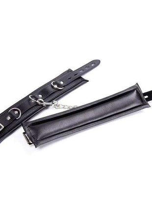 Ankle Cuffs Black with smooth black leather-look straps, adjustable buckle closures, and metal rings and chain details