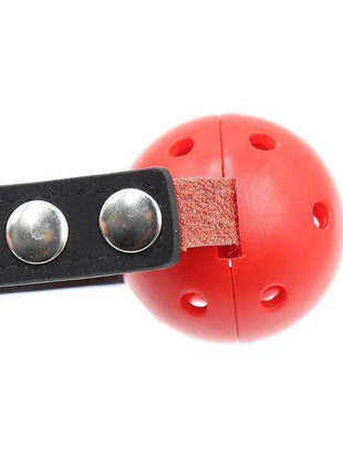 Ball Gag Breathable Black/Red with a red perforated ball and black faux leather strap secured by metal snaps