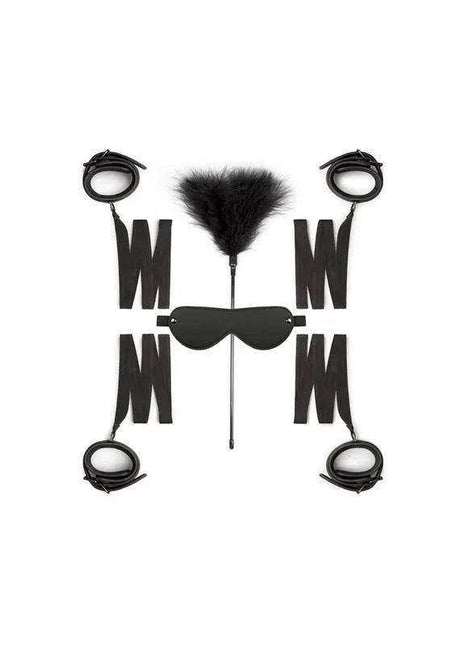 Beginners Bondage - Fantasy Kit featuring black straps, wrist restraints, a blindfold and a feather tickler