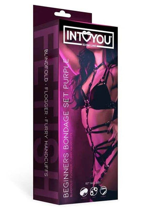Beginners Bondage Set in purple packaging, with glossy black restraints pictured and a bold pink-purple design.