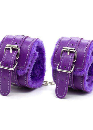 Bondage Set 10 Pieces Purple with two purple faux leather cuffs, plush lining, silver buckles and connecting chain