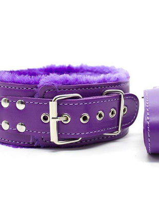 Purple bondage set with 10 pieces including cuffs, blindfold, whip, tape, collar, and leash