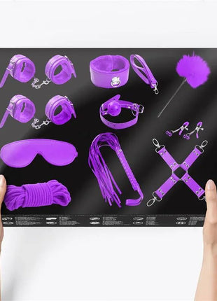 Purple bondage set with 10 pieces including cuffs, blindfold, whip, collar, and leash for beginners and enthusiasts