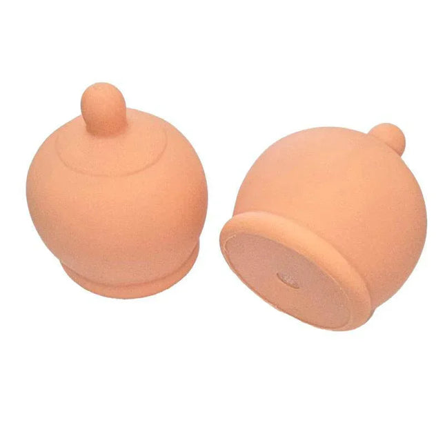 Breast shaped whistle
