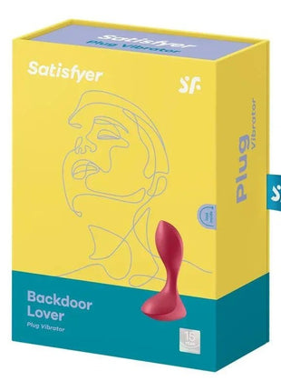 Butt Plug Backdoor Lover Red featuring a pink silicone plug with a tapered tip, rounded body and flared base beside yellow and teal packaging