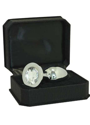 Butt plug metal with a polished silver finish, rounded tapered body and large clear faceted jewel set in its base