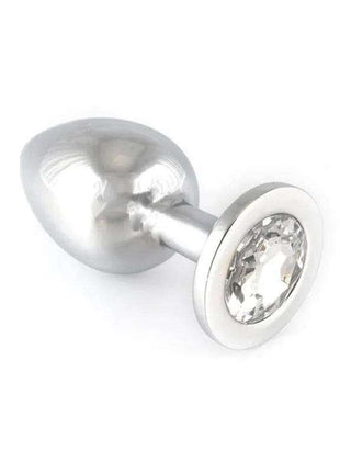 Butt plug metal with a polished silver finish, tapered oval base and a large clear faceted jewel set in the flared stopper