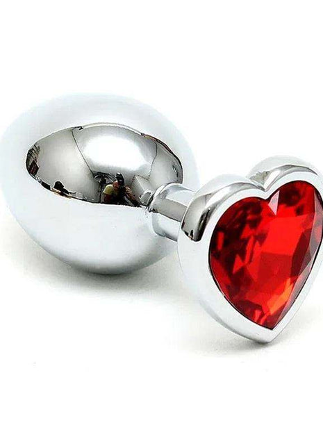 Butt Plug Plated Steel with a polished silver finish and a faceted red crystal heart set in the flared base