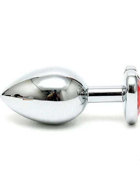 Butt Plug Plated Steel with a smooth, reflective silver finish and rounded bulb, accented by a red heart crystal