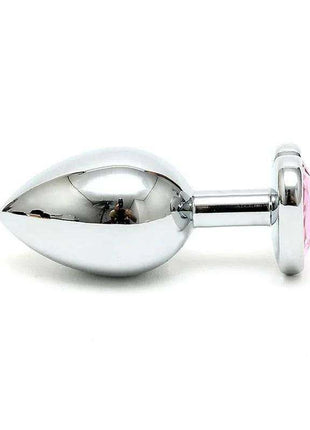 Butt Plug Steel Crystal Heart Pink with a polished silver steel body, tapered tip, and pink heart crystal base