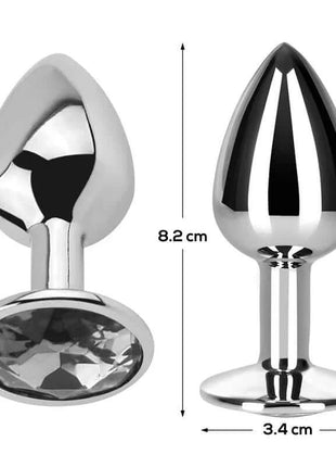 Butt Plug with Jewel in polished silver-tone aluminium, featuring a faceted clear oval jewel and tapered plug shape
