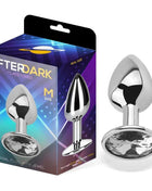 Butt Plug with Jewel in polished silver aluminium, featuring a faceted clear gem on a circular base and teardrop stopper