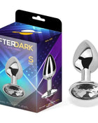 Butt Plug with Jewel in polished silver metal, featuring a teardrop-shaped plug and large clear oval gem base
