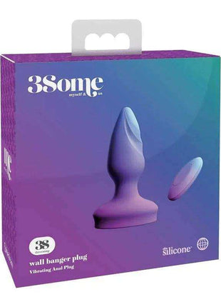 Butt Plug with Vibration in purple silicone, with a tapered plug shape, flared base and separate oval remote