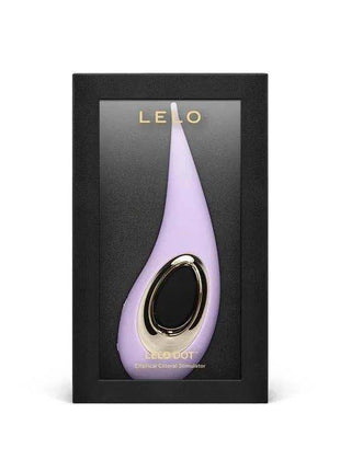 Clitoris Stimulator in lilac silicone with a tapered flexible tip, oval black control and gold-tone trim, displayed in LELO packaging