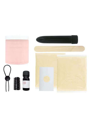 Cloneboy Dildo with Vibrator DIY molding kit with black vibrator, pink container, beige modeling materials and accessories.