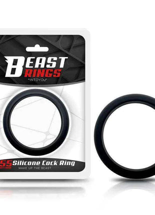 Cock Ring Solid Silicone in black, a thick circular silicone loop shown beside its retail packaging