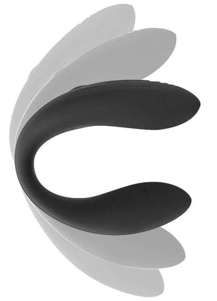 Couply Couple Toy in smooth black silicone, featuring a flexible curved body with two rounded extensions