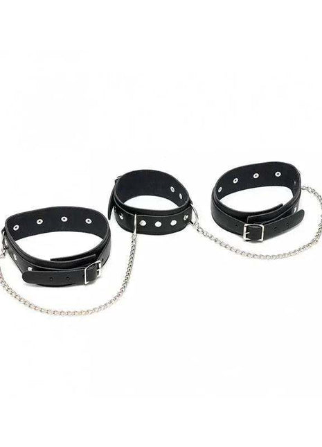 Cuffs-Adjustable black leather-look cuffs with silver-tone buckle closures, eyelets and dangling chain details