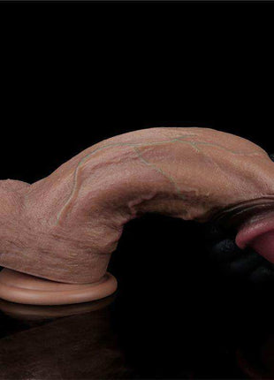 Dildo Dual Layered Silicone XXL 11 in realistic flesh tone, with a curved textured shaft, rounded tip and suction cup base.