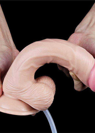 Dildo Squirting 9 Natural in pale pink realistic PVC, curved textured shaft with pink squeeze bulb and clear tube