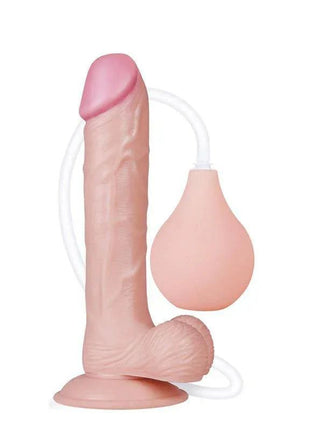 Dildo Squirting 9 Natural with a realistic pale pink textured shaft, suction base, clear tube and soft squeeze bulb