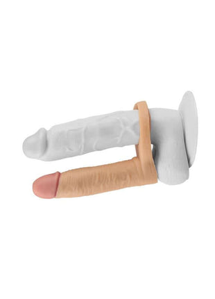 Dildo The Ultra Soft Double with two textured shafts in white and flesh tones, joined by a flexible strap and broad base.