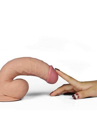 Dildo The Ultra Soft Dude in flesh-toned soft material, curved with a textured shaft, rounded tip and suction cup base
