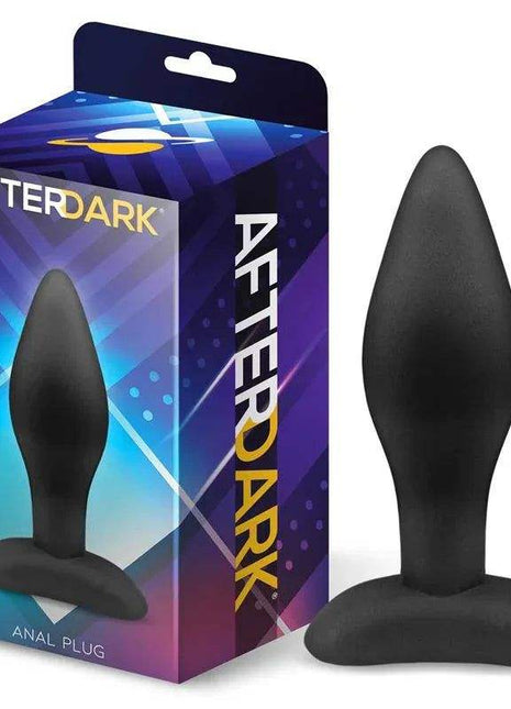 Dolmen Butt Plug in matte black silicone, with a smooth tapered bulb and wide flared base beside its After Dark box