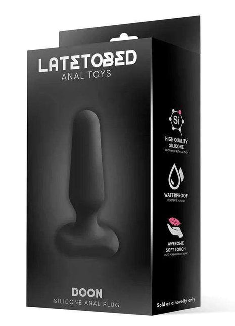 Doon Silicone Butt Plug black silicone anal toy shown as a tapered plug with a wide flared base on its box