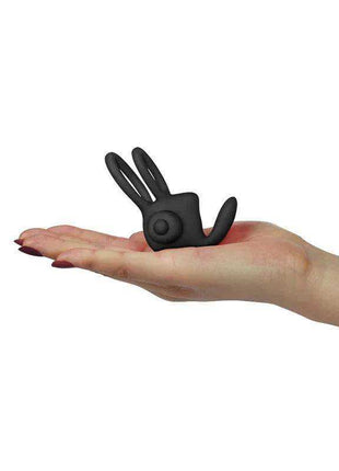Double Vibrating Cockring in black flexible silicone with a compact rounded control unit and two looped bands