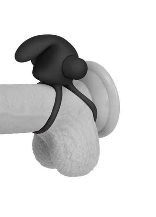 Double Vibrating Cockring in black silicone with a flexible loop, rounded clitoral stimulator and attached vibration bullet